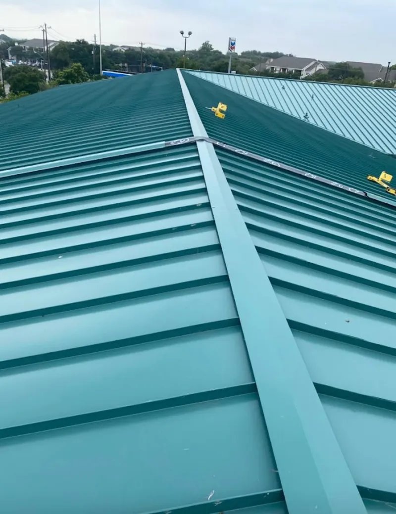 Green commercial metal roof ridge and valley for Metal Roof Repair in South Brooksville